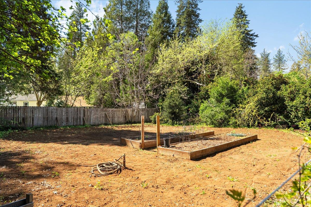 10041 Greenwood Road Grass Valley, CA 95945 - Photo 48 of 65 a view of a backyard of the house