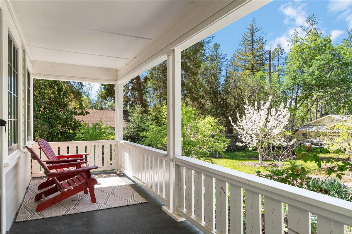 10041 Greenwood Road Grass Valley, CA 95945 - Photo 53 of 65 a view of a two chair in the balcony