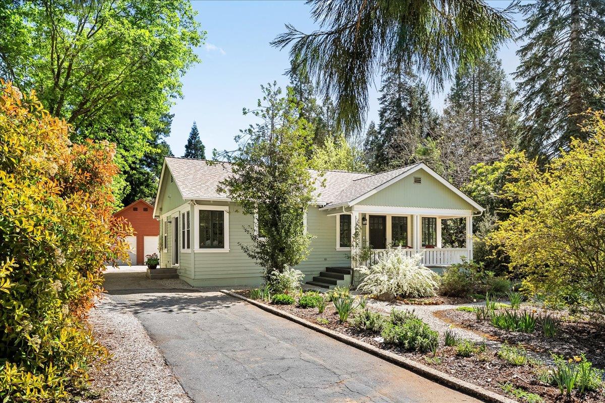 10041 Greenwood Road Grass Valley, CA 95945 - Photo 57 of 65 a front view of a house with a garden