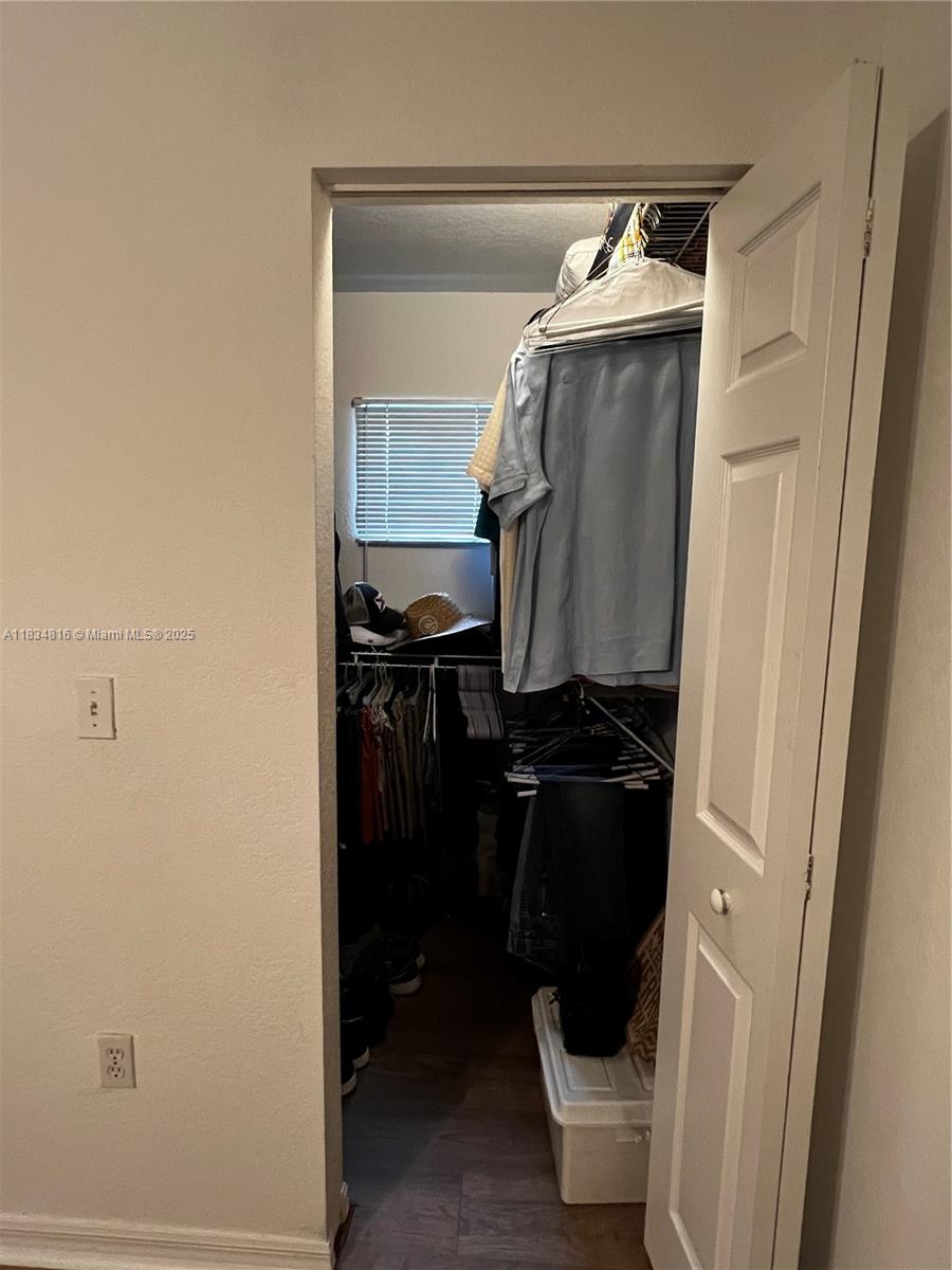 2548 Centergate Drive, Unit 301 Miramar, FL 33025 - Photo 11 of 12 a bathroom with a toilet and a shower