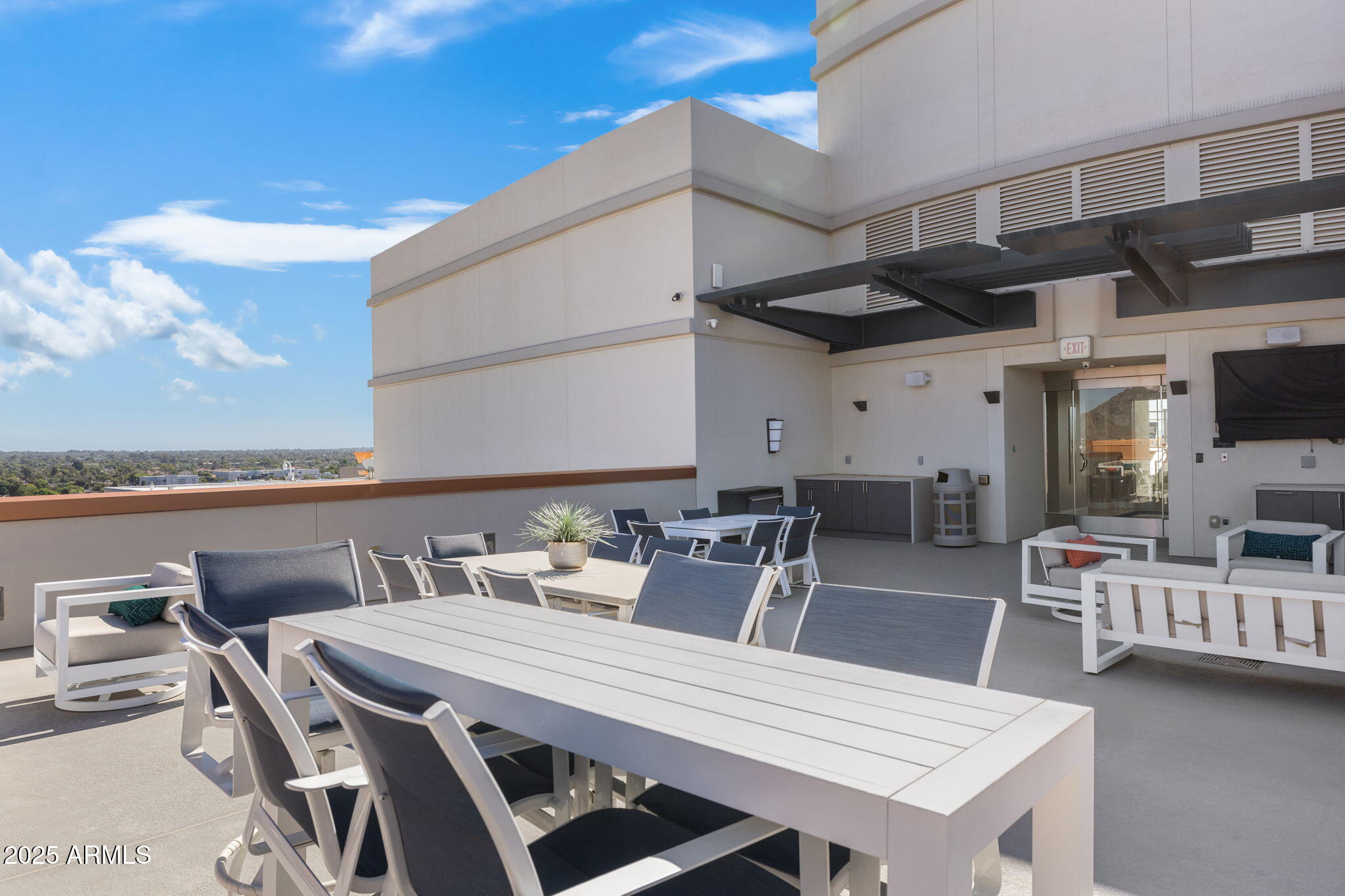 2211 East Camelback Road, Unit 607 Phoenix, AZ 85016 - Photo 40 of 41 a view of an outside dining space with furniture