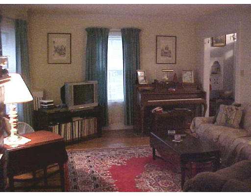 12 Bellingham Road Worcester, MA 01606 - Photo 3 of 6 a living room with furniture and a flat screen tv