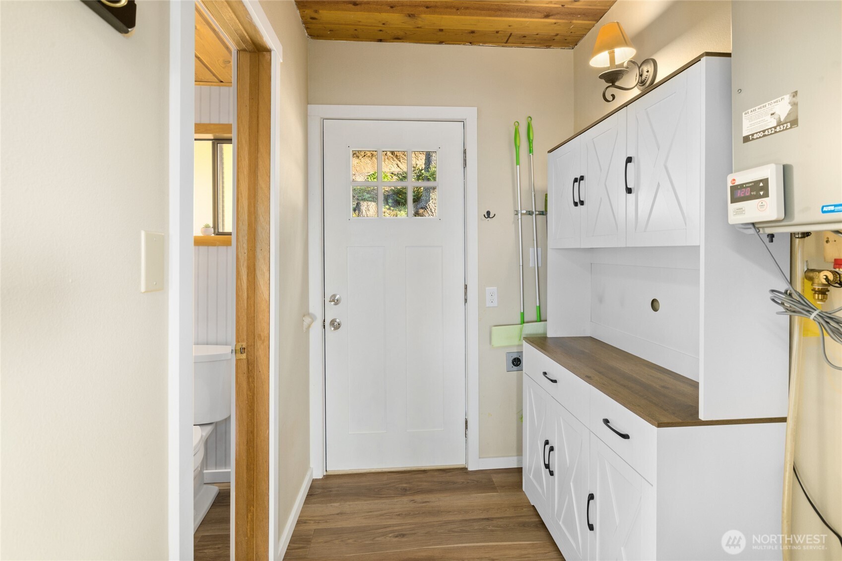 811 Horse Heaven Road Cle Elum, WA 98922 - Photo 16 of 40 a kitchen with granite countertop white cabinets and white appliances