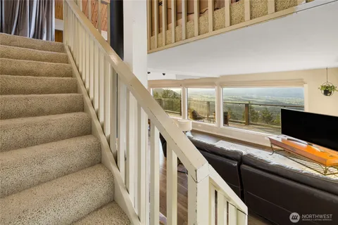 a view of balcony with furniture