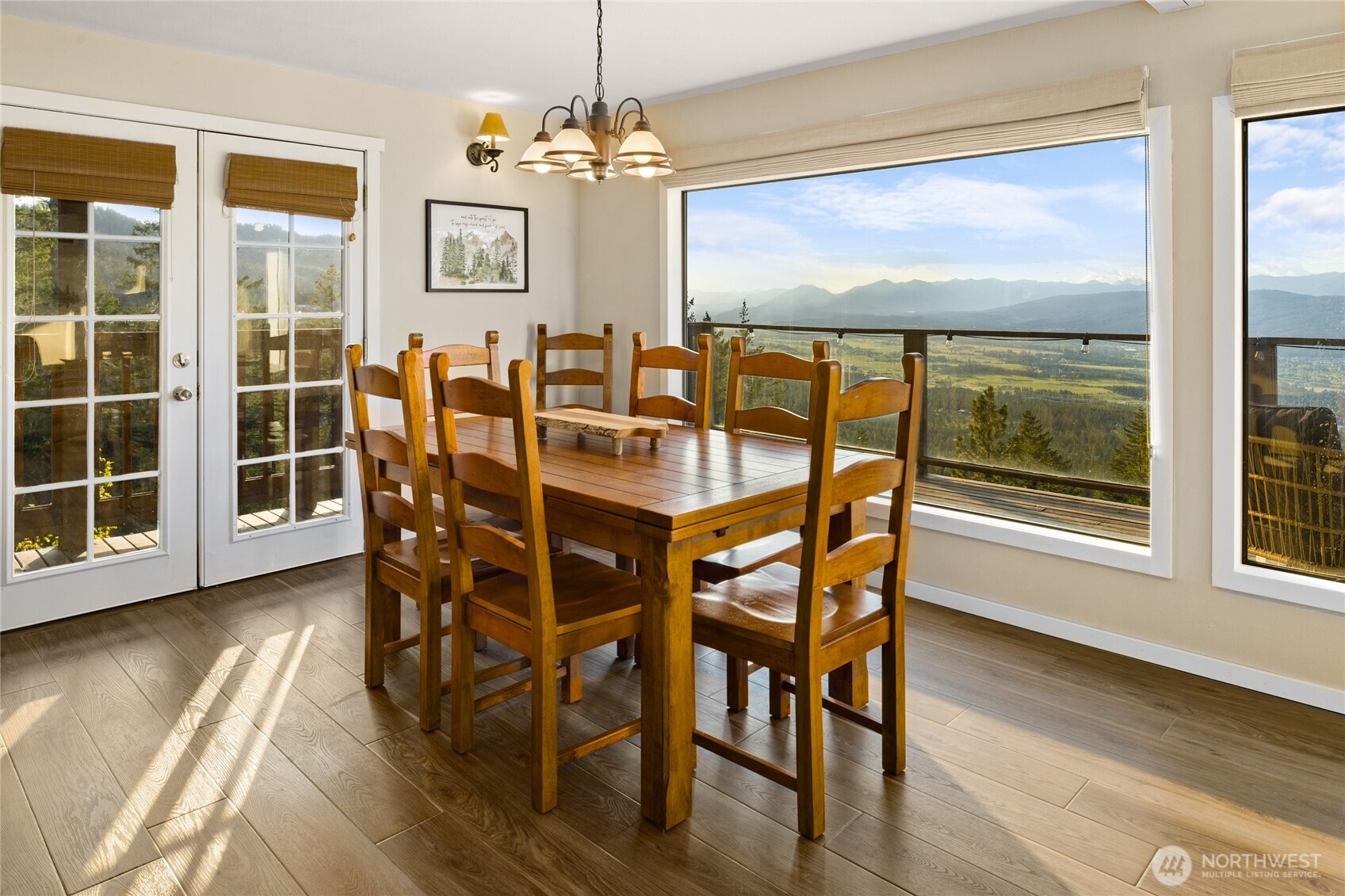 811 Horse Heaven Road Cle Elum, WA 98922 - Photo 6 of 40 a view of a dining room with furniture window and wooden floor