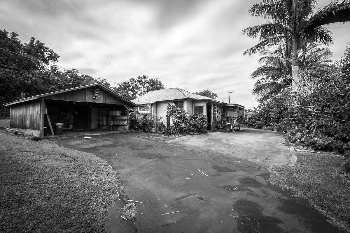 2229 Haiku Road Haiku, HI 96708 - Photo 2 of 28 a front view of a house with yard and parking