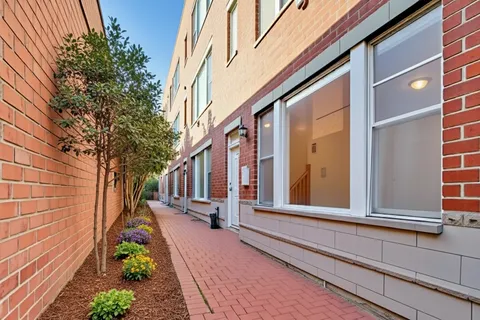 a view of a house with a street
