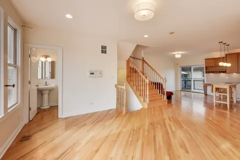 a view of a livingroom with wooden floor
