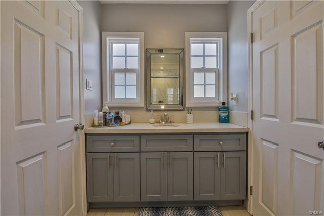 a bathroom with a shower and toilet