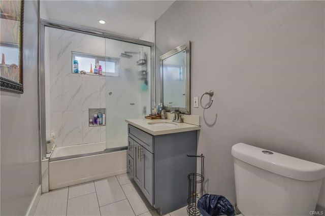 a view of street with parked cars