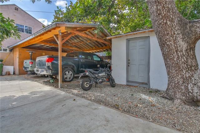 an aerial view of a swimming pool and outdoor space