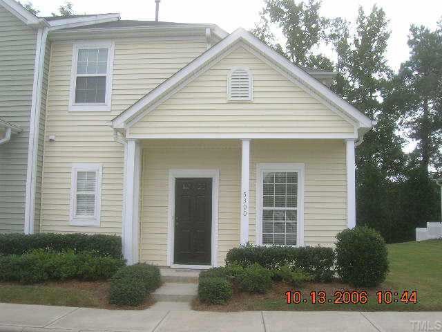 5300 Patuxent Drive Raleigh, NC 27616 - Photo 1 of 1 a front view of a house with garden