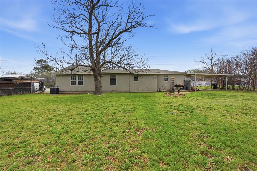 7701 John T White Road Fort Worth, TX 76120 - Photo 22 of 23 a front view of house with yard