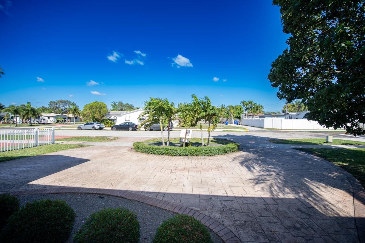 5012 Taft Street Hollywood, FL 33021 - Photo 2 of 36 a view of a garden