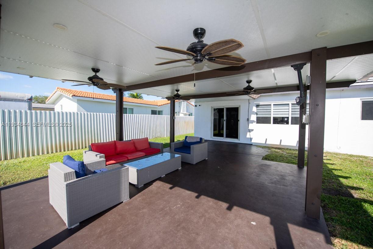 5012 Taft Street Hollywood, FL 33021 - Photo 27 of 36 a living room with furniture