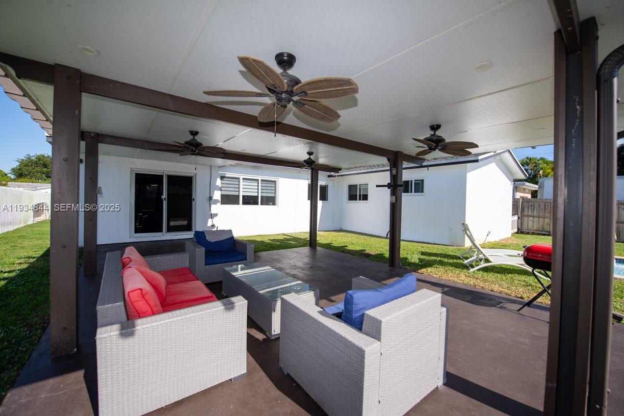 5012 Taft Street Hollywood, FL 33021 - Photo 28 of 36 a view of living room and patio