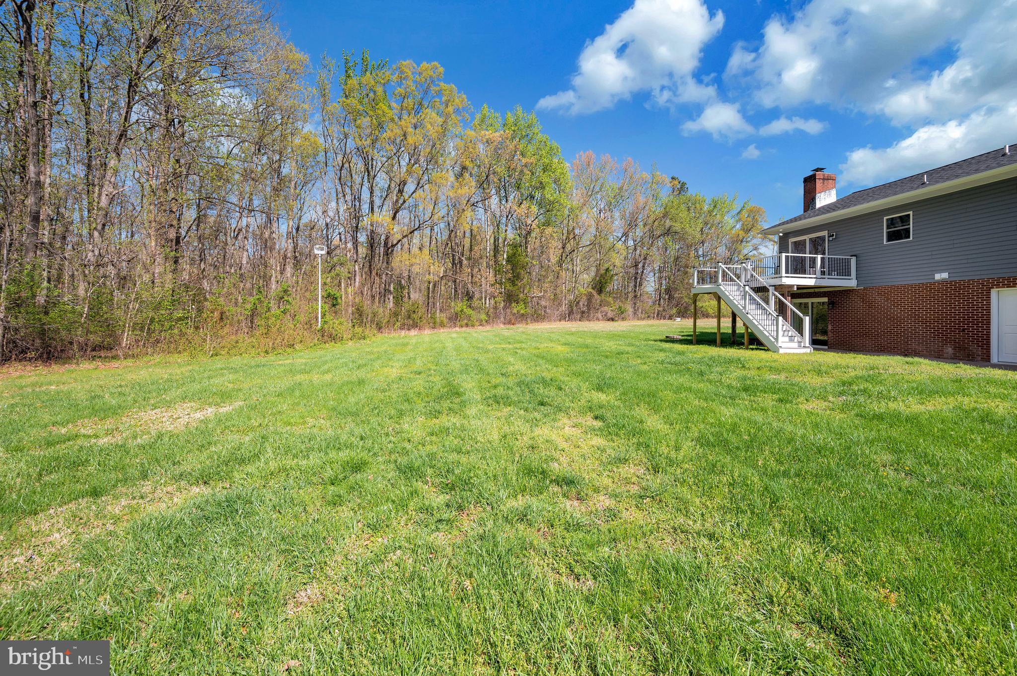 13452 Post Oak Road Spotsylvania, VA 22551 - Photo 11 of 56 a view of a backyard with green space