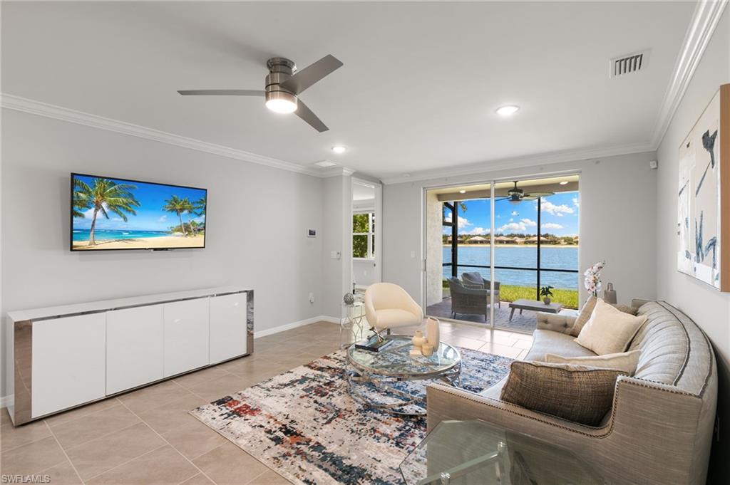 14618 Edgewater Circle Naples, FL 34114 - Photo 12 of 47 a living room with furniture