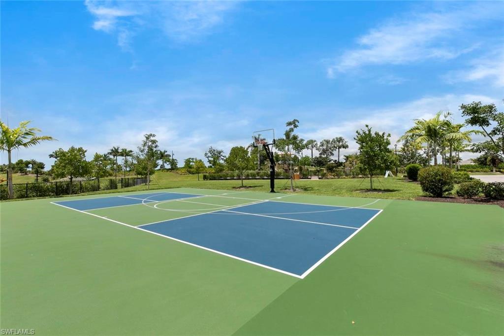 14618 Edgewater Circle Naples, FL 34114 - Photo 41 of 47 a view of a tennis court