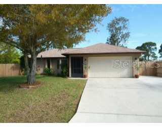 843 Nantucket Road Venice, FL 34293 - Photo 1 of 1 a front view of a house with garden