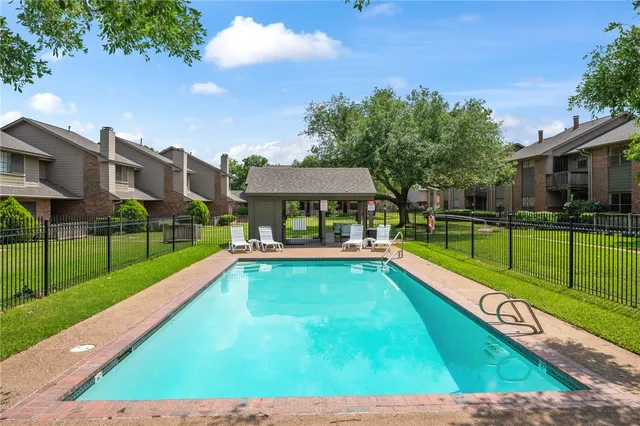 a view of house with garden space and trees
