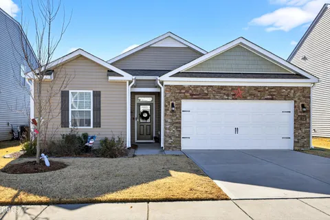 a view of a house with garage