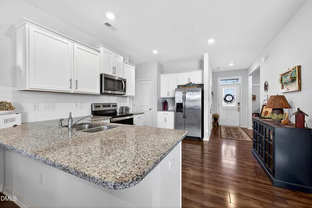 a living room with furniture workspace and a window