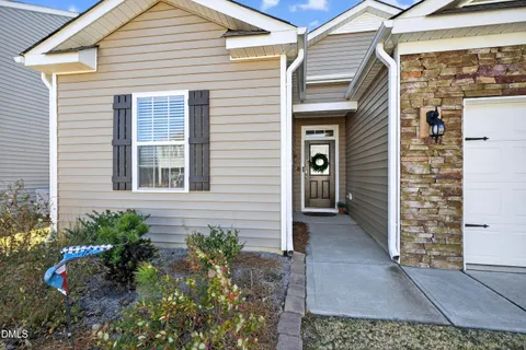 a front view of a house with a porch