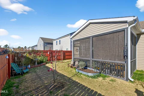 a view of a backyard of a house