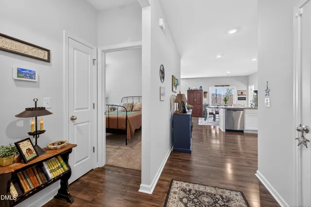 a kitchen with stainless steel appliances granite countertop a refrigerator stove microwave and sink