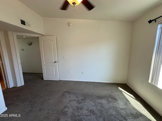 a bathroom with a sink a mirror and a vanity