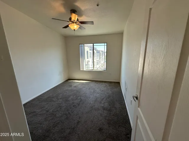 a bathroom with a double vanity sink toilet mirror and bathtub