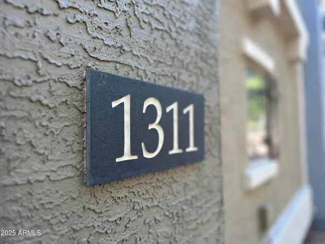 a view of a kitchen with furniture and a window