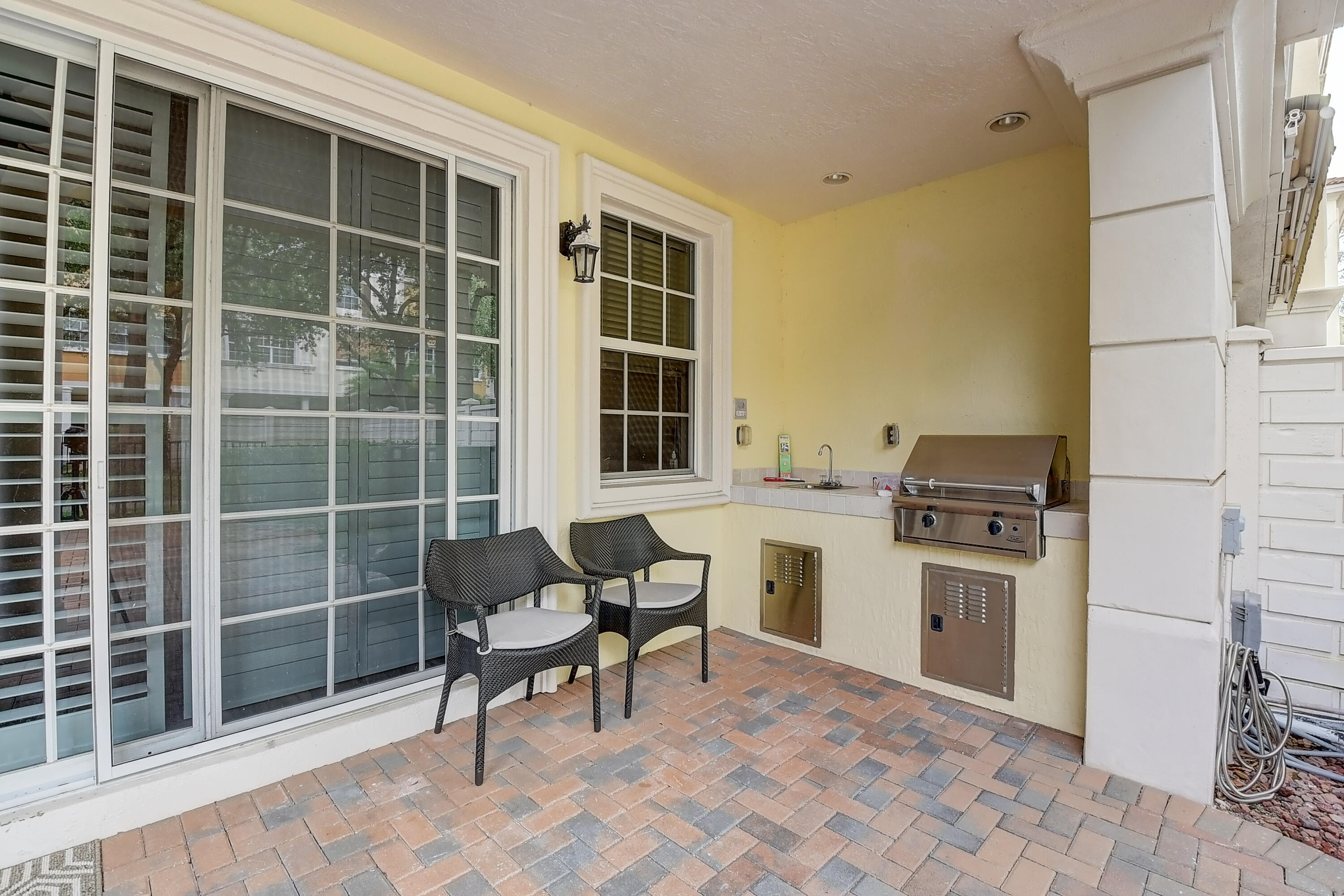 5645 Northeast Trieste Way Boca Raton, FL 33487 - Photo 28 of 36 Lanai with outdoor kitchen