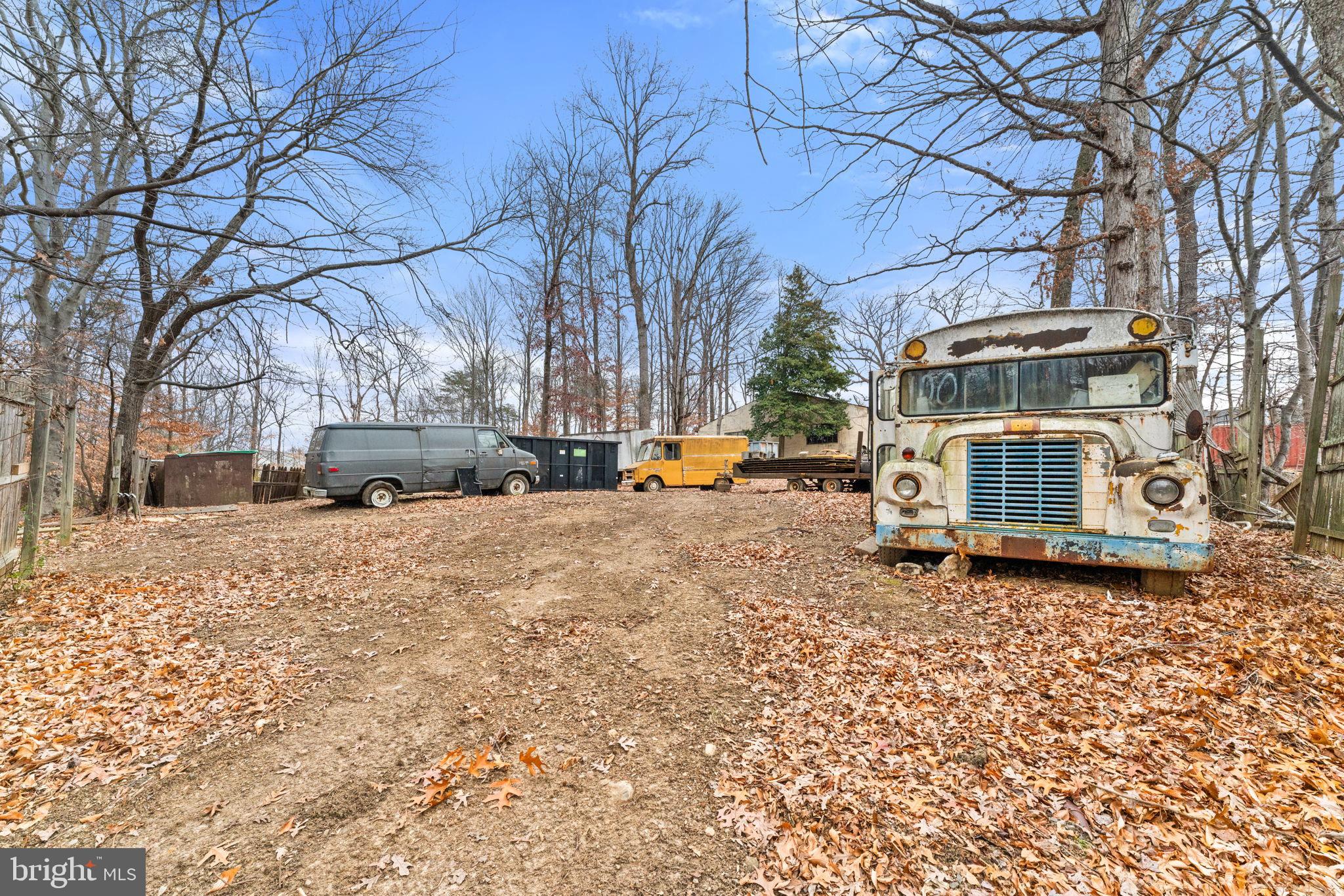 8906 Hooes Road Fairfax Station, VA 22039 - Photo 14 of 45 a view of a yard with a cars