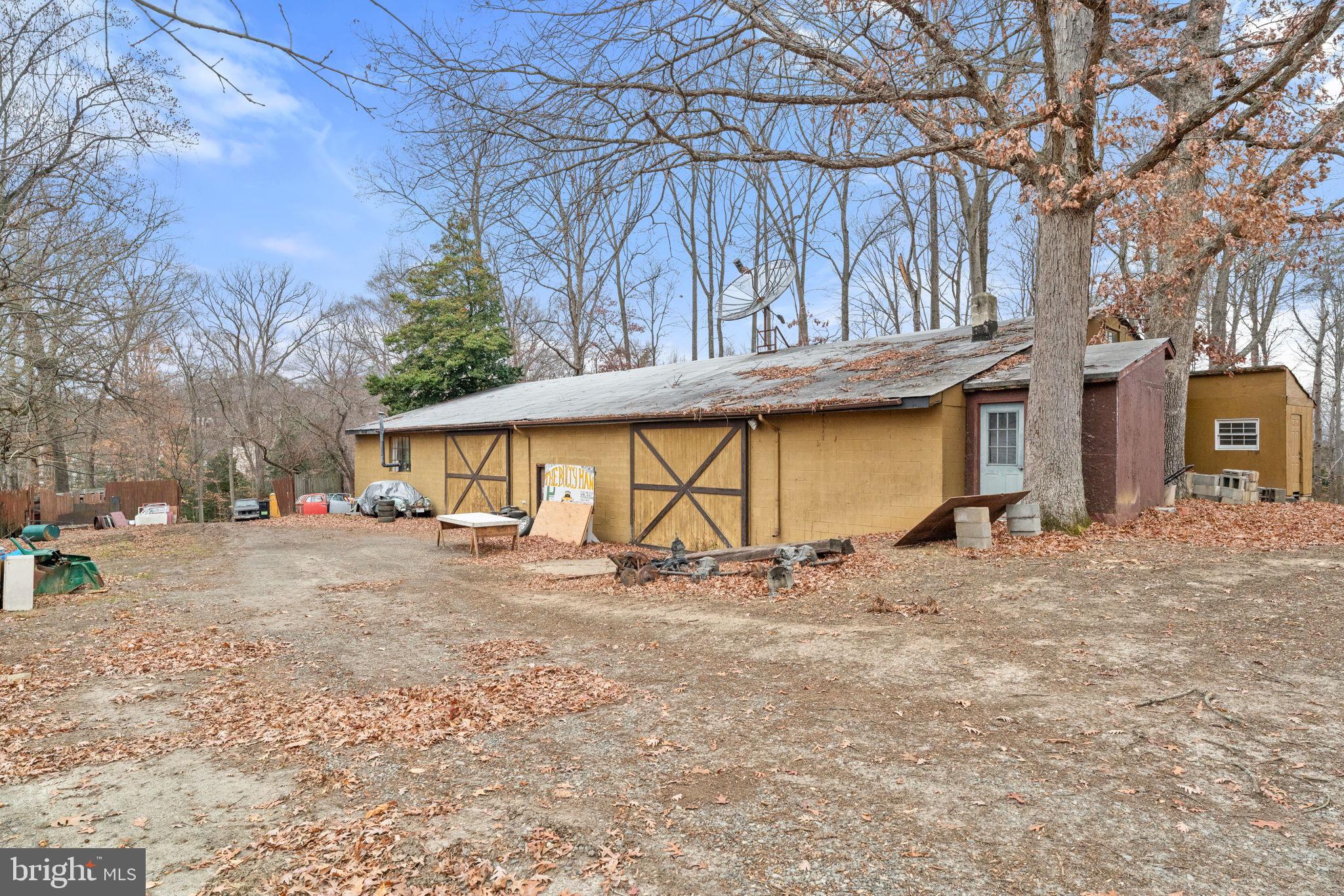 8906 Hooes Road Fairfax Station, VA 22039 - Photo 20 of 45 a view of a house with a yard