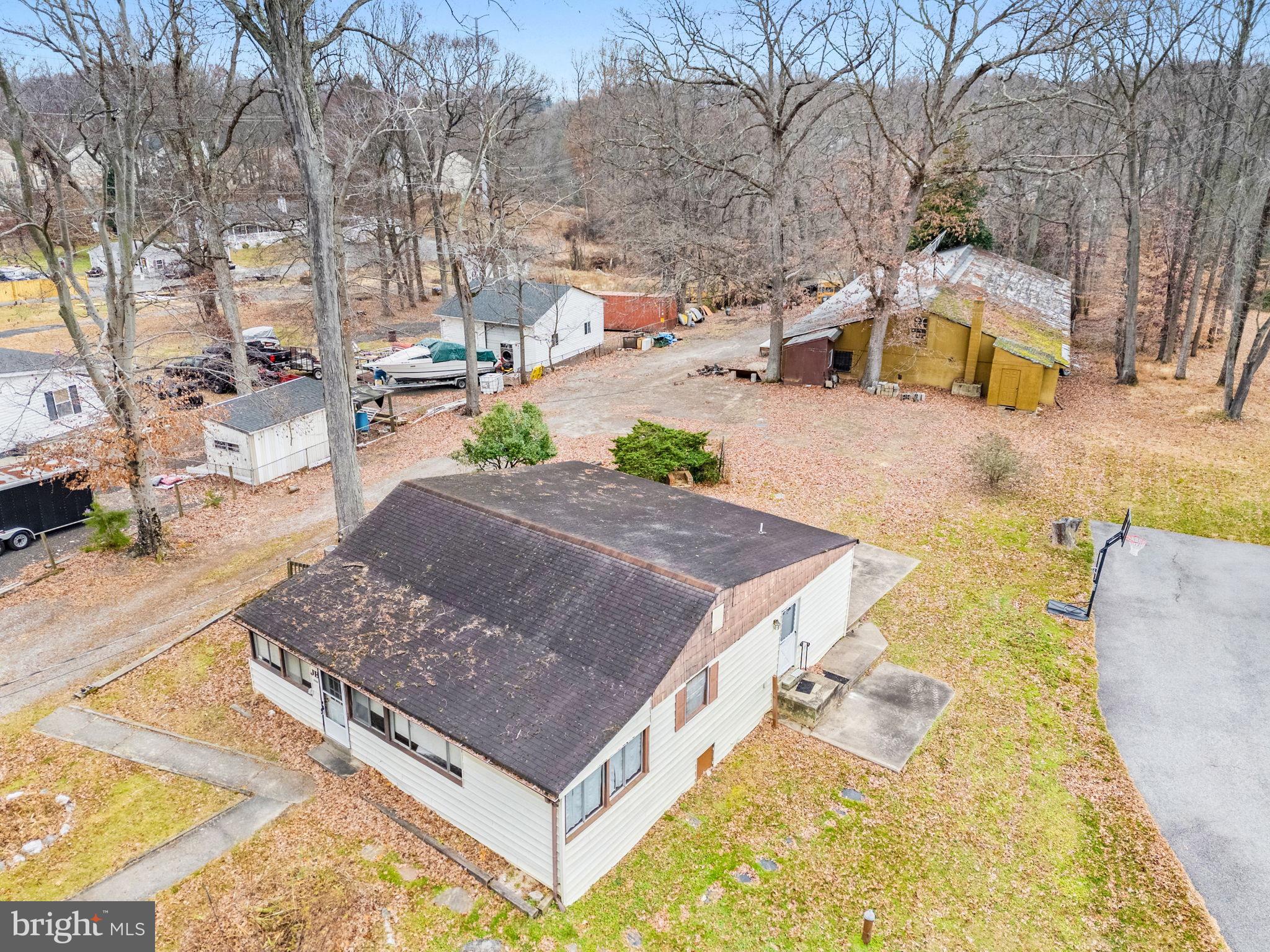 8906 Hooes Road Fairfax Station, VA 22039 - Photo 26 of 45 a view of a swimming pool with a patio