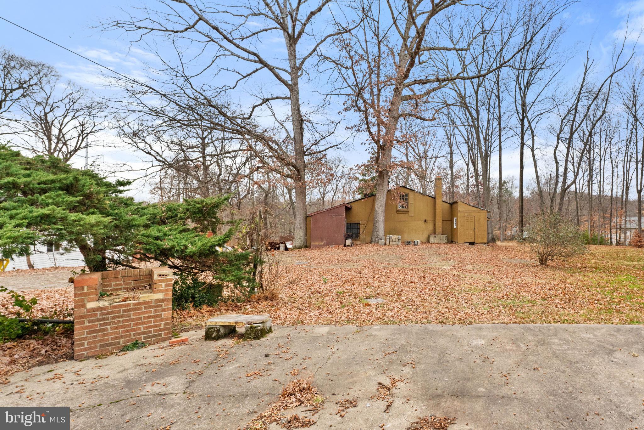 8906 Hooes Road Fairfax Station, VA 22039 - Photo 30 of 45 a view of a yard with a tree