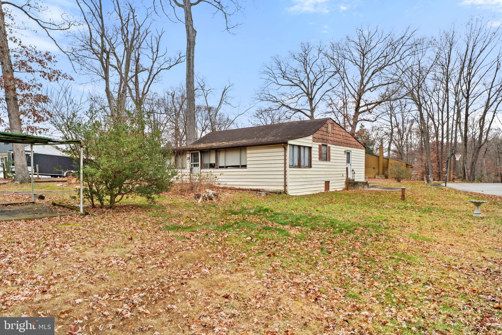 8906 Hooes Road Fairfax Station, VA 22039 - Photo 31 of 45 a view of a house with a yard