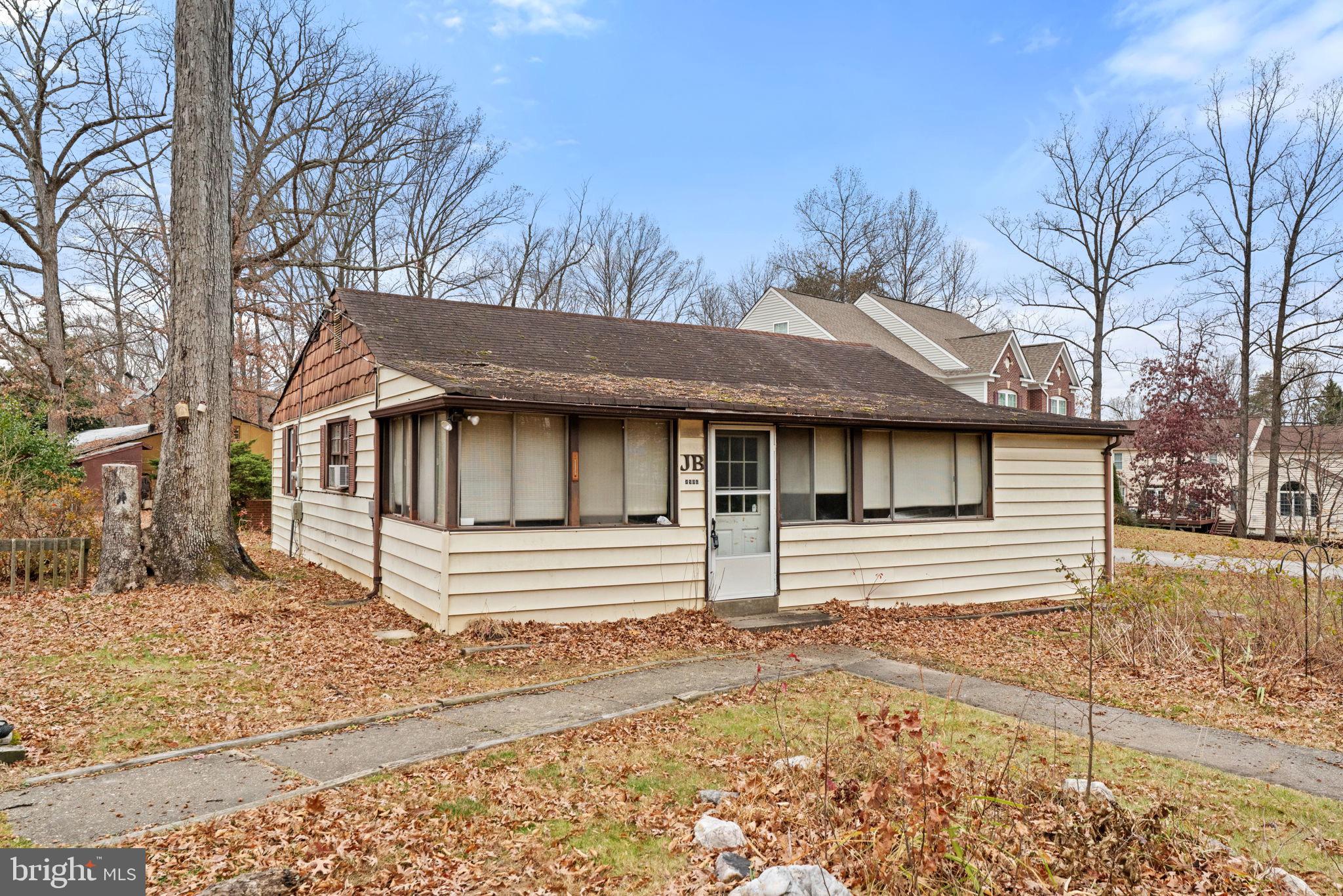 8906 Hooes Road Fairfax Station, VA 22039 - Photo 37 of 45 a view of a house with a snow on the road