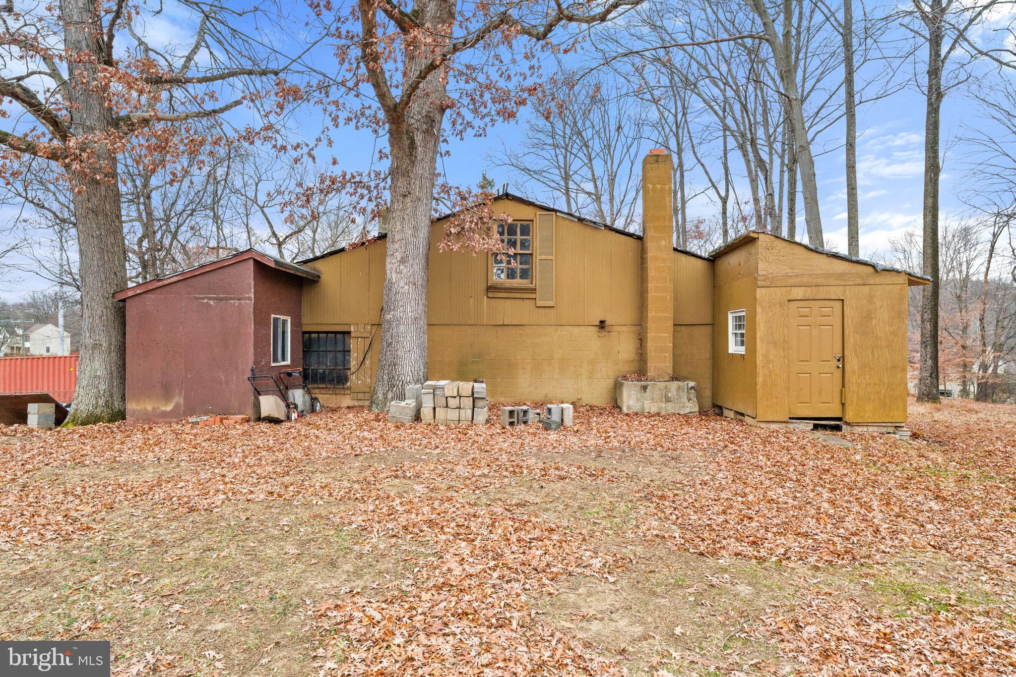 8906 Hooes Road Fairfax Station, VA 22039 - Photo 7 of 45 a front view of a house with a yard