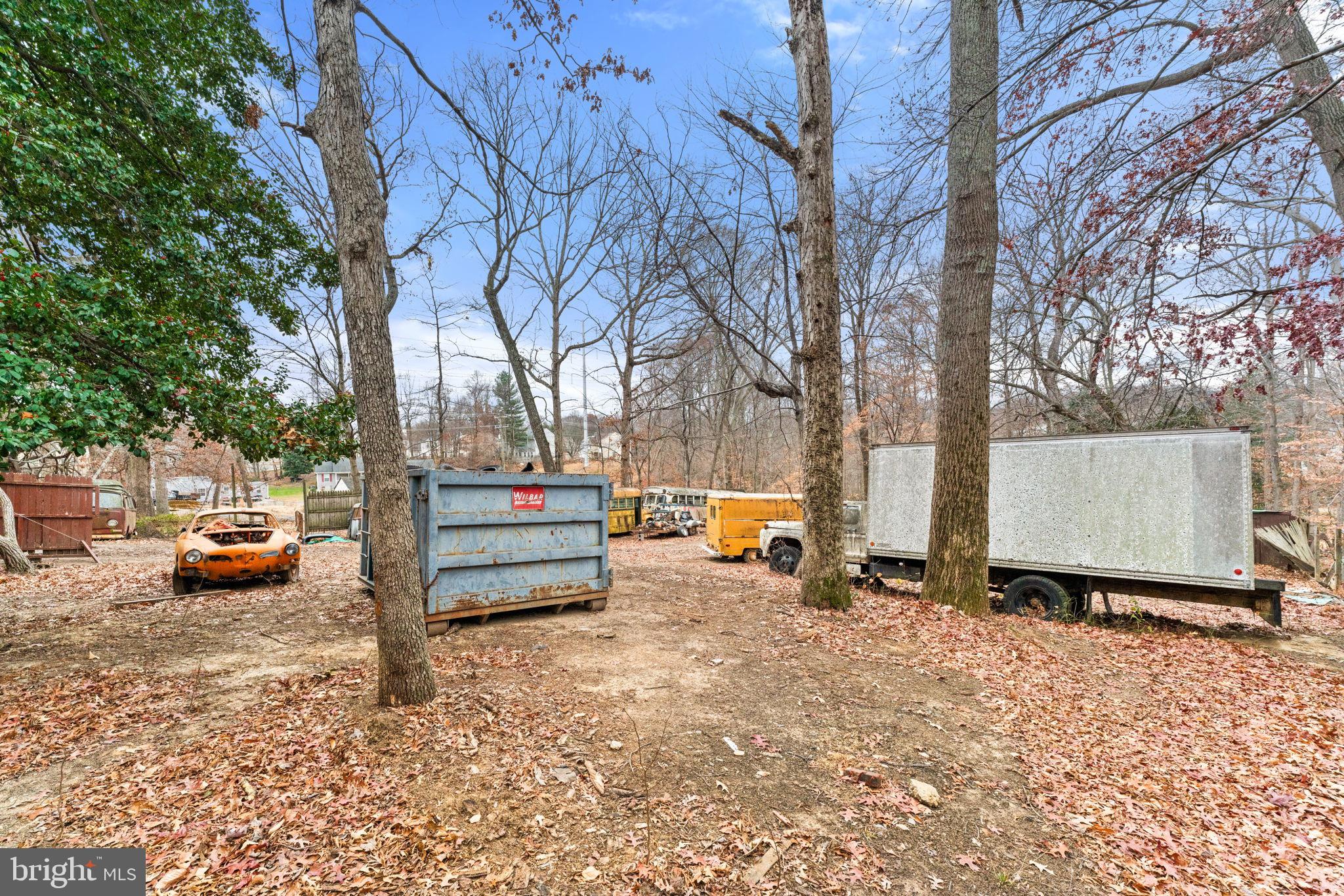 8906 Hooes Road Fairfax Station, VA 22039 - Photo 9 of 45 a backyard of a house with barbeque oven and outdoor seating