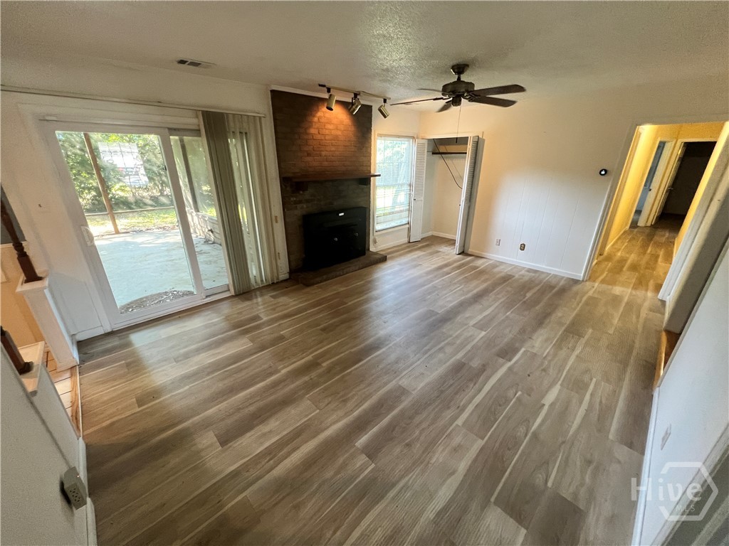 308 Wendy Hill Road Savannah, GA 31410 - Photo 8 of 26 Family Room towards bedrooms