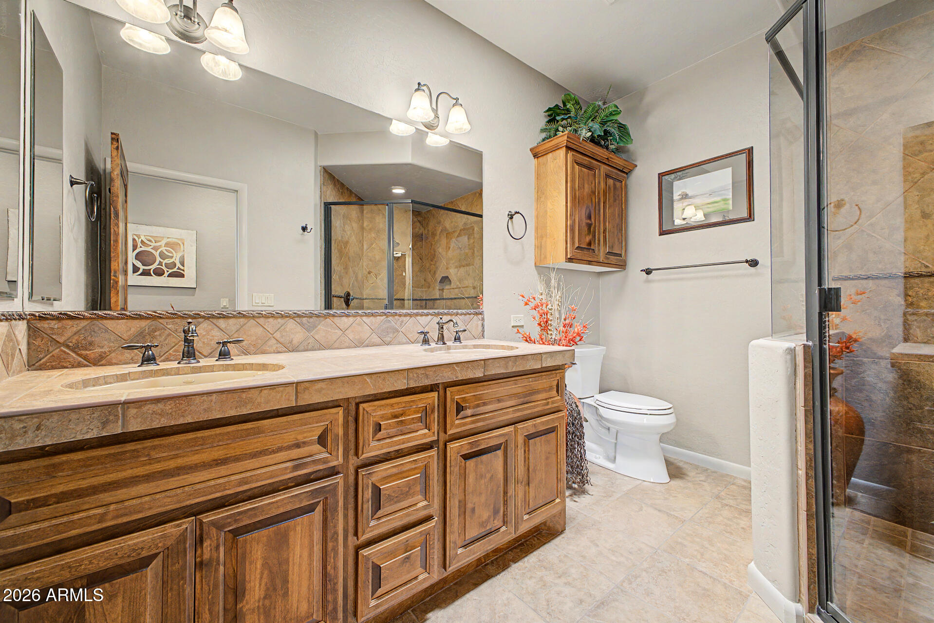 27909 North Quail Spring Road Rio Verde, AZ 85263 - Photo 26 of 52 a spacious bathroom with a granite countertop sink mirror and toilet