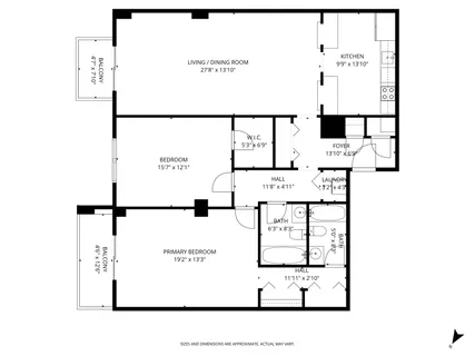 a view of an ocean with a building in the background