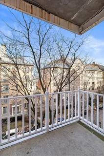 a view of a house with a street