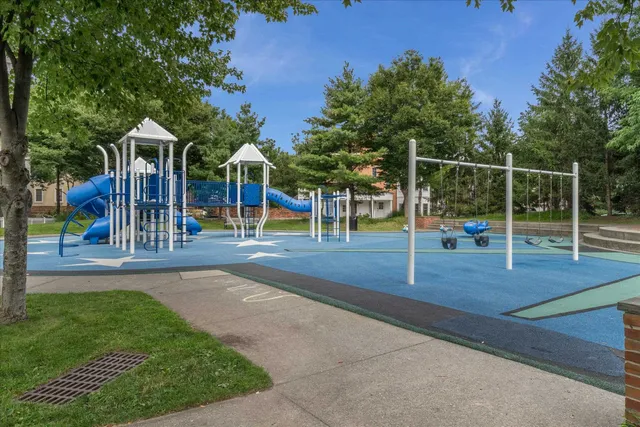 a view of park with iron fence