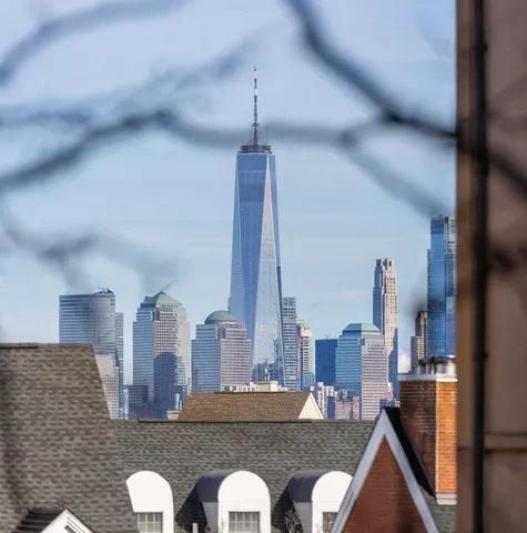 a view of living room with furniture and floor to ceiling window