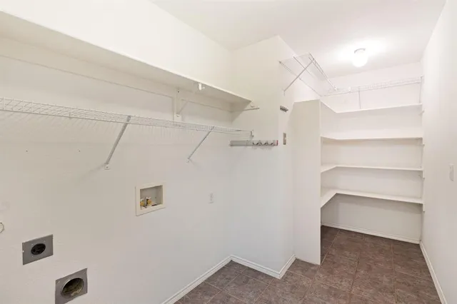 a view of a room with racks on the wall