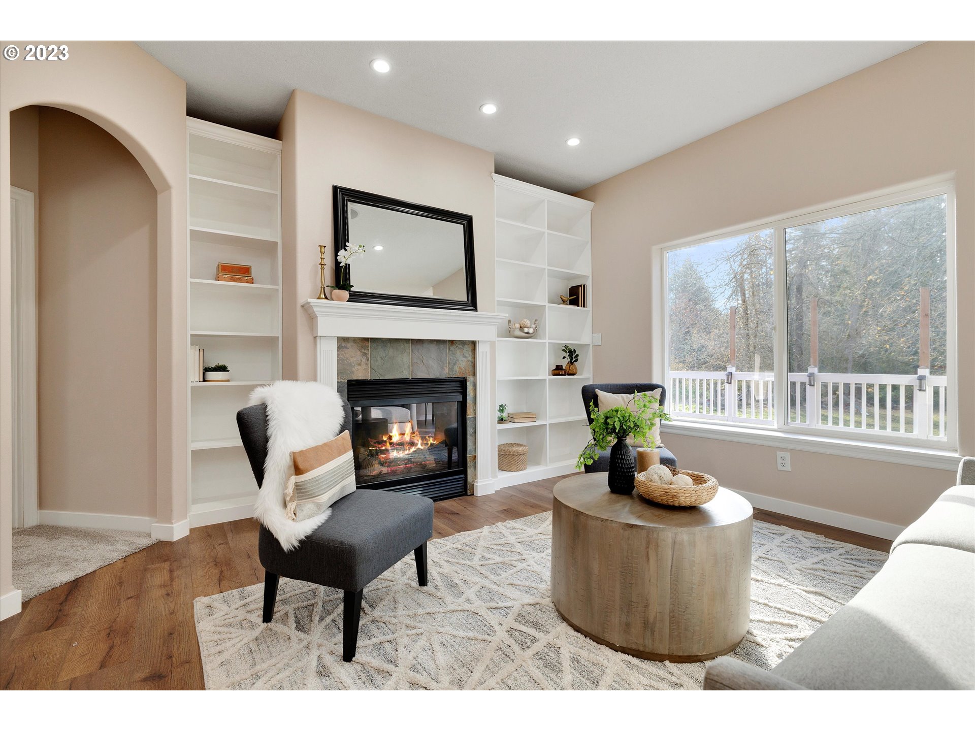 19053 South Mattoon Road Estacada, OR 97023 - Photo 10 of 47 a living room with furniture a fireplace and a table